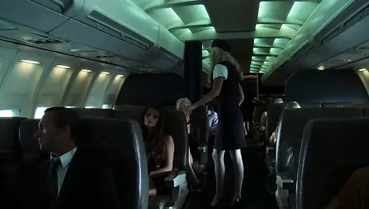 Lucky hunk gets to fuck two hot passenger babes on board an aeroplane