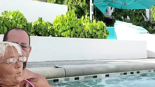 Getting frisky in the hot tub. Boob play.