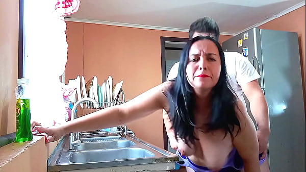 Fucking my stepmom in the kitchen topless and moaning loudly