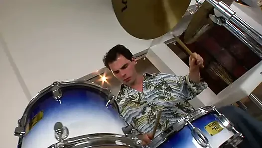 Amazing blonde sucks the cock of a young drummer