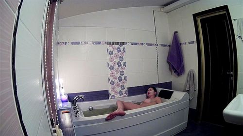 Kamila gets horny on the bath tub and plays with her pussy by VoyeurHouse.com