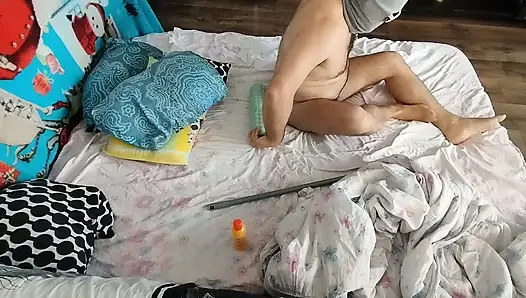 Sensual massage of a hot amateur couple with oil on the body.
