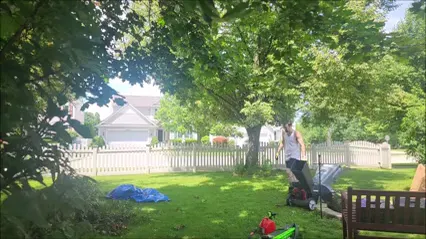 Man Gardening with Mulcher