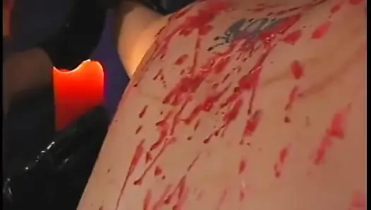 Two mistresses tweak bdsm fattie's boobs and whip her ass