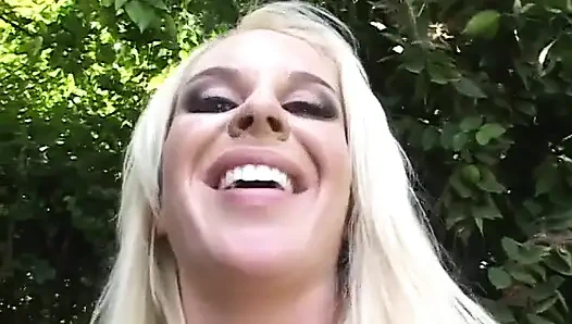 Blonde babe rides a hard black cock while giving head