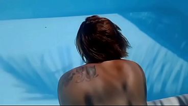 Married redhead showing off at the condo pool.