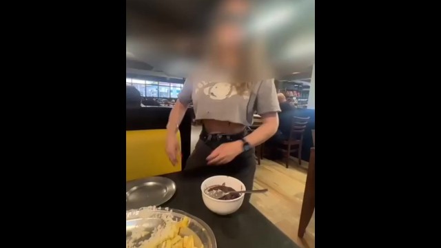 Showing breasts in the restaurant