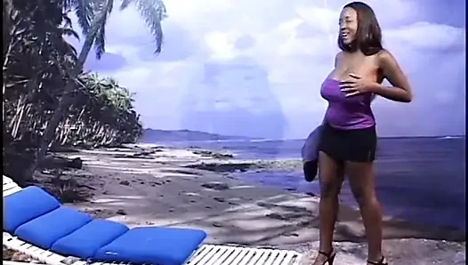 Sweet black babe gets naked by the ocean
