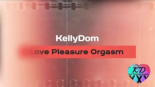 Kelly fingering her big clit while Dominik licks her feet and masturbates on her leg