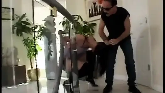 Two dudes are fucking sexy brunette slut's holes on the couch