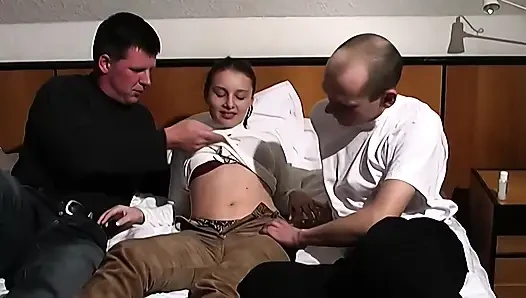 Redhead Slut Gets Pounded Hard by Two Guys