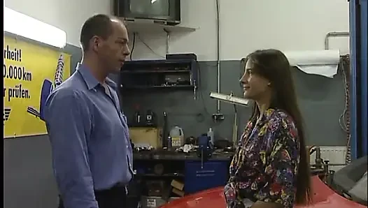 Brunette teen gives blowjob and gets fucked by older car shop owner