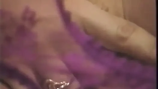 Busty babe slips fingers deep inside her pussy while on the couch