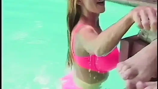 Blonde and brunette sluts get horny while sunbathing and fuck each other by the pool