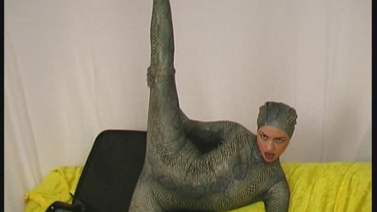 Edita dressed like a flexible snake
