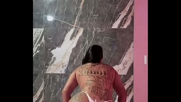 Brazilian woman with her vagina showing.