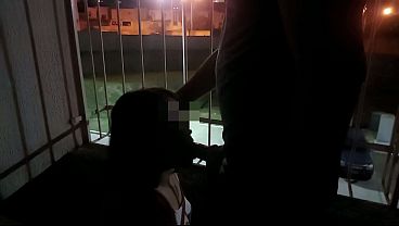 I went out to the balcony with my husband's friend and gave him a deep, wet blowjob.