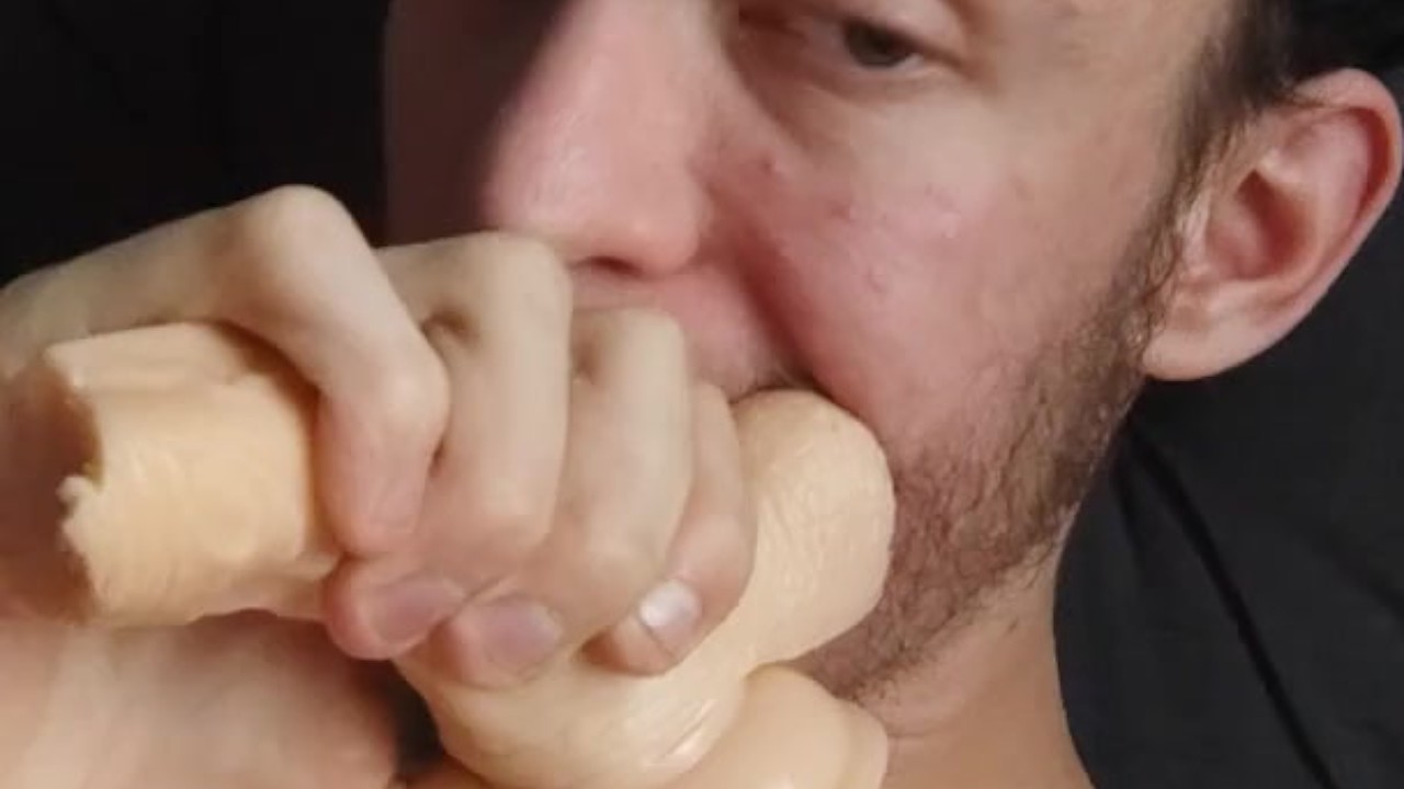 Biting and chewing my dildo