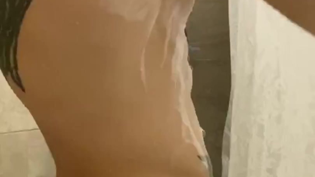 I caress my body with foam in the shower