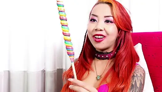 Two horny asian lesbians take on a big lollipop