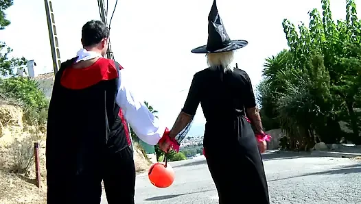 Hot blonde with big tits roughly fucked by two bad guys in the woods dressed up for Halloween