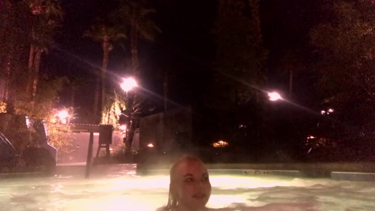 Topless in the hotel hot tub
