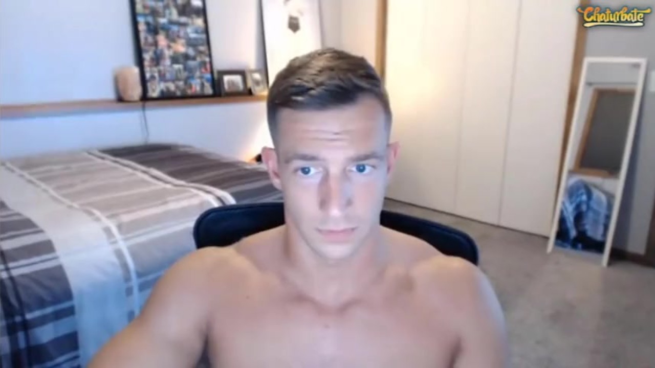 Handsome stud jerks off on cam