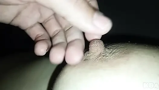 My husband plays and sucks my swollen nipples, I am warmed by the rich sounds he makes when he licks my juicy tits