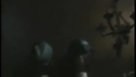 Bound man is subdued with strange penis remedy by two chicks in dungeon