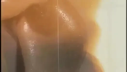 Two Exotic Beauties with Slender Tanned Bodies Caress Each Other's Wet Pussies