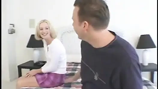Lusty blonde gets double-teamed on bed