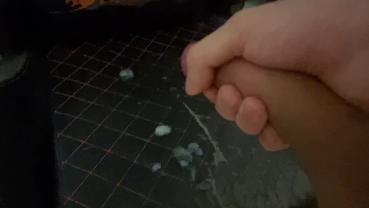 A young guy jerks off an uncut huge cock and ends up with a fountain of sperm