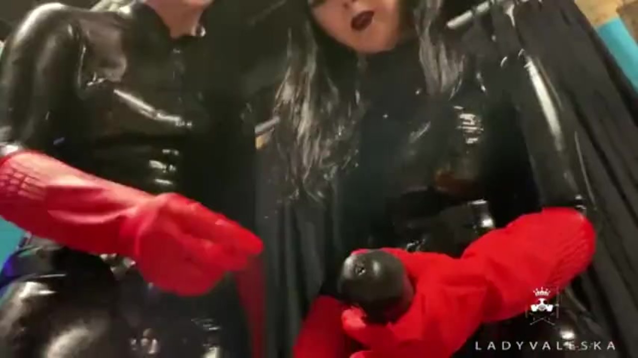 Trailer - Latex Dommes Invite You To Suck Their Huge Strap Ons