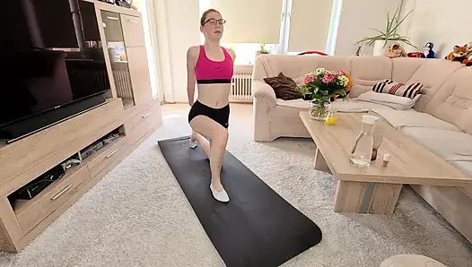 Redhead Teen masturbates with glass and sports slippers