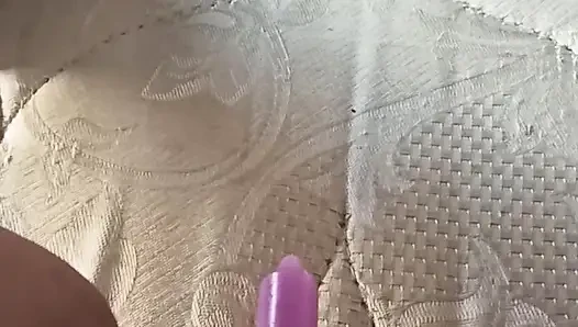 Trying hard to put all the candle in my ass