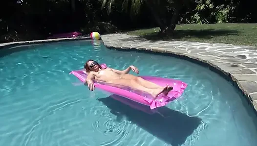 Teen whore fingers her pussy in the pool then rides a cock hard
