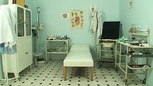 Hot and horny brunette with wet pussy masturbates in doctor's office then gets facial
