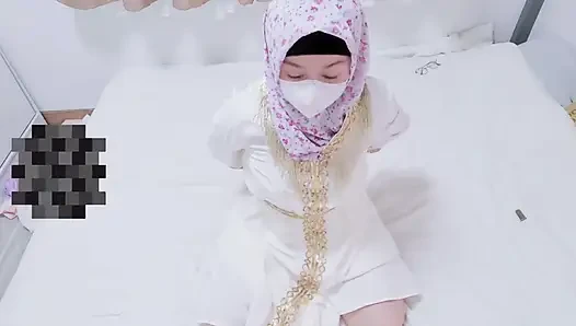 A Malaysian Hijabi Girl Teasing with White Abaya Showing off Her Ass