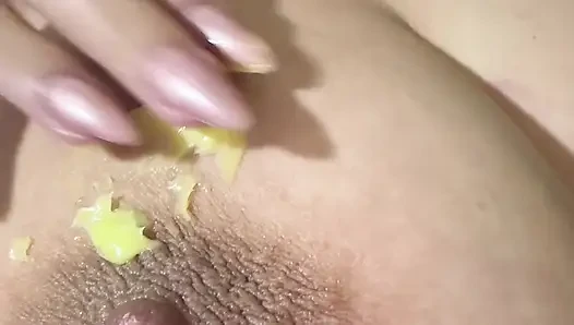 Hot sexy blonde fills her huge nipple with cream
