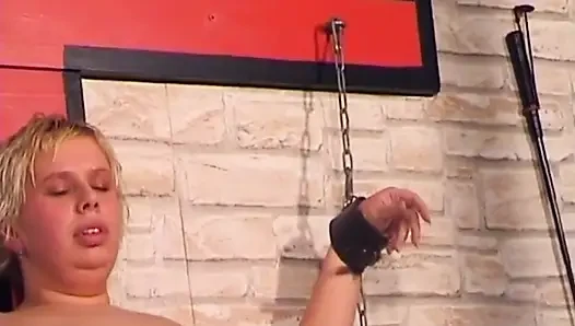 Mature Mistress Covers Her Bound Slave in Hot Wax