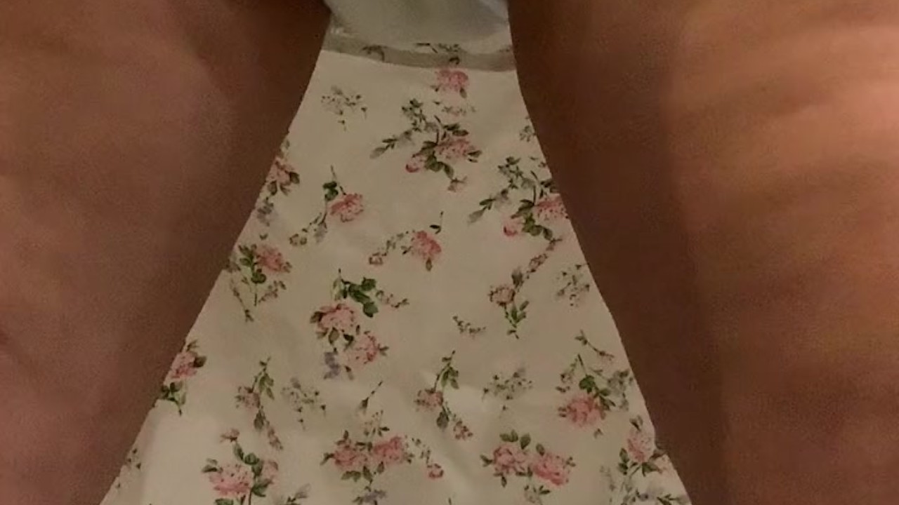 Up skirt view of girl pissing in diaper