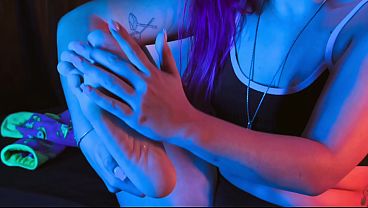 Kissing her feet and pleasuring her pussy with a dildo.