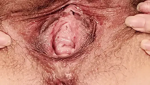 Wife opens her hairy pussy wide open