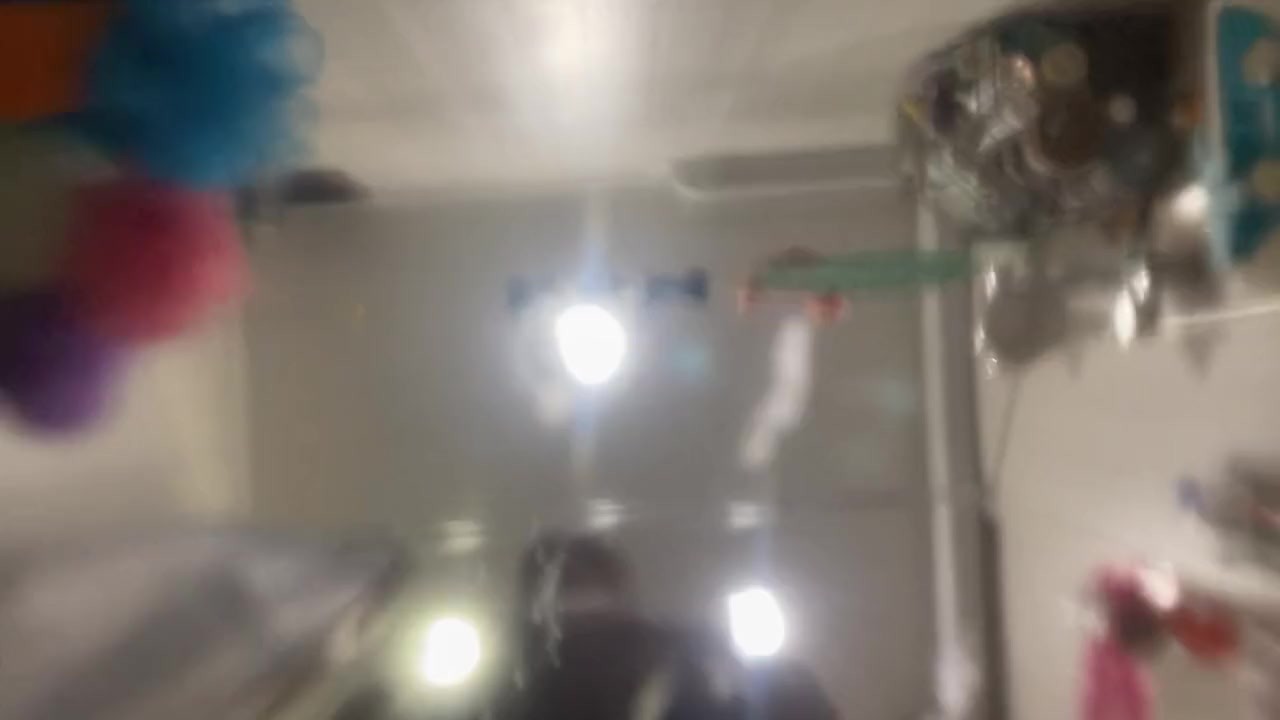A man pisses on your face in the bathroom