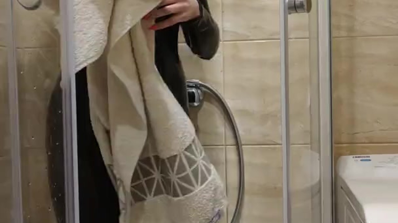 Arish Lamborghini in latex suit taking shower