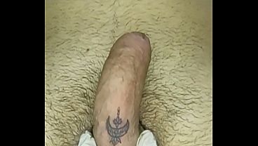 Showing off the finished tattoo on the penis.
