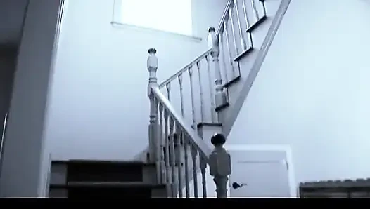 Busty slut deep throats dude's dick on a staircase before fucking