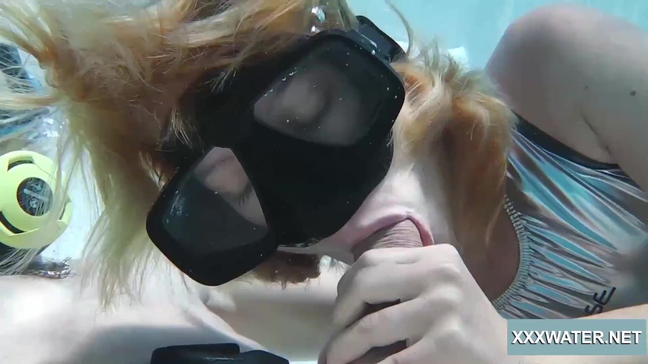 Two hot girls blow big cock in the pool